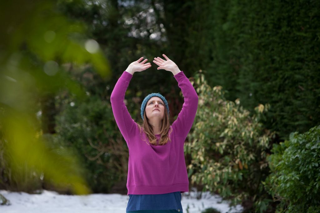 Jenny Oakenfull founder of Active-Eat doing yoga in the snow