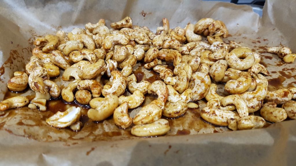 Photo of Roasted cashew nuts on a baking tray